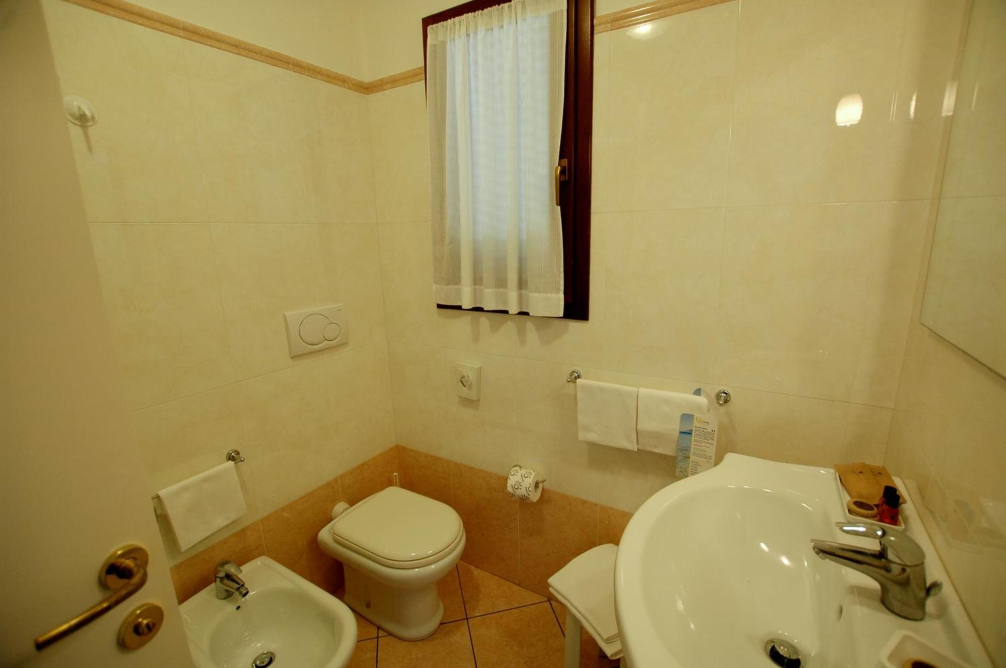 Hotel Mistral Marina di Campo Rom bilde
